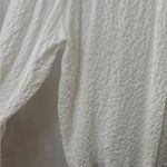 Elegant White Button Photo 4