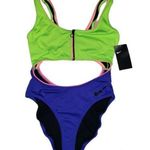Nike women's medium indigo burst color block cut out one piece swimsuit nwt Photo 0