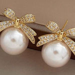 Gold and Pearl Bow Earrings Photo 0
