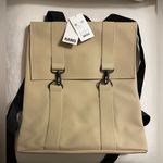 NWT Rain MSN Bag Signature Water Proof Backpack PU Fabric Color: Sand Photo 0