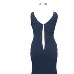 Betsy and Adam . Christine Scuba Crepe Ruffled Bow Gown. Photo 11