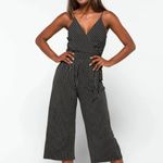 Kaileigh  Chic Black and White Striped Jumpsuit Photo 6