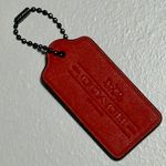 Coach Red Leather Hangtag 1941 with Carriage Stamped
FOB bag charm. Photo 4
