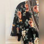 Trixxi Black and Pink Floral patterned short sleeve romper Photo 2