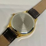 Footprints women’s quartz analog watch gold tone 30mm brown leather band running Photo 6