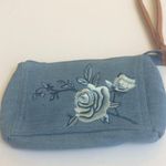 Ladies' Avon Small Embroidered Denim Wristlet Photo 0