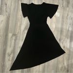 We Wore What NWT  Black Asymmetrical Cutout Dress Short Sleeve Flower Pin Size L Photo 4