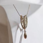 Silver Tone Necklace with Unique Pendant Charm Photo 1