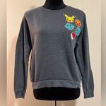 Pokémon EUC Pokemon Gray Sweater with Pokemon Patches size medium Photo 0