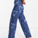 Topshop Oversized Mom Jeans with Bleached Hearts in Mid-Blue | 24P Photo 2
