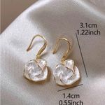 Elegant Gold and White Floral Earrings Photo 4