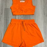 Orange Two Piece Outfit Photo 0