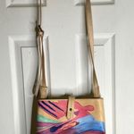 The Sak  Tan and Pink Crossbody Bag with Artistic Design Photo 1
