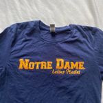 Notre Dame navy blue and yellow shirt Photo 1