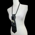 “Dainty Dapper” Black necktie Necklace with Gold and Pink Accent serpent pin. Photo 3
