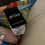 Privy  Smocked High Low Off shoulder Floral Dress Photo 3