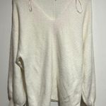 1. State  Elegant White Women's Sweater Photo 0