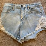 Mossimo Supply Co Mossimo High Rise Distressed Lace Boho Jean Shorts Photo 0