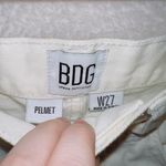 Urban Outfitters BDG Off White Denim High Rise Cut Off Pelmet Shorts size 27 Photo 2