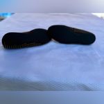 UGG  Women's brown Slippers with Gold studs . Photo 1