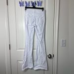 Almost Famous EUC women’s solid white flare ripped distressed stretch jeans 0 Photo 3