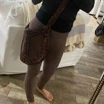 Brown leather purse. Bohemian style Photo 1