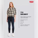 Levi's Levi’s Women's 711 Mid Rise Distressed Skinny Jeans in Black Size 27 Photo 2