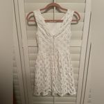 White lace embroidered floral scoop neck v back dress! Size undefined Photo 1