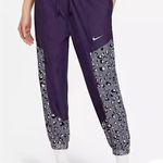 Nike Sportswear Dark Raisin Iron Grey Purple Leopard Print Track Pants Womens S Photo 0