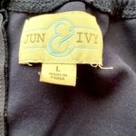 Jun & Ivy | Navy spaghetti strap sundress with embellishments at the waist. Photo 7