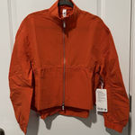 Lululemon Crinkle Nylon Cinchable Jacket Size XS NWT $148 Sunburst Orange Photo 0