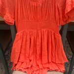 Altar'd State NWT  Vibrant Orange Romper. Photo 0