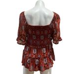 Maurice's Women's L Red Geometric Smocked Peplum Blouse Short Sleeve Photo 1