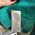 Charter Club  green V-neck sweater with a gold-tone toggle closure. Photo 8
