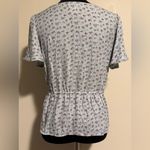 Urban Romantics EUC  Light Blue Floral V-Neck Babydoll Blouse size large Photo 4