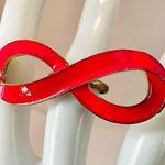 Pink and gold tone infinity ring Photo 0