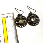 Brass tone circle rhinestone earrings Photo 6