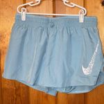 Nike Running Dri-FIT Swoosh mid-rise brief-lined shorts in pale blue size medium Photo 4