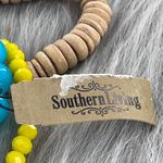 Set of three stretch bracelets glass, shell and gold colored metal. Blue Photo 1