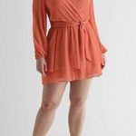 EXPRESS  women’s size large Tie Waist Ruffle Romper in melon corral color Photo 0