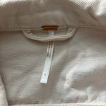 Free People light cream colored jean jacket Photo 1