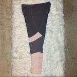 Athleta Powervita Salutation Stash Modblock Tight Photo 5