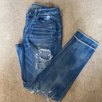 American Eagle Medium Wash Distressed Raw Hem TomGirl Jeans Size 4 Photo 0