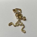 Signed KKIED Gold Tone Brooch Pin Athlete / Lady Running Hinged Swinging Legs Photo 1