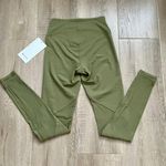 Lululemon Nulu and Crisscross Mesh Stirrup Tight Bronze Green size 4 NWT Photo 5