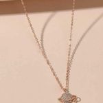 Planet and star necklace Photo 1