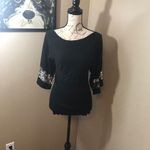 Studio Y  size medium black knit pull over silver Photo 1
