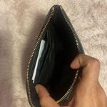 Coach Brand new  wristlet in black and brown Photo 2