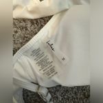 Lulus Lulu’s White Ruffle Bikini Top. Size medium. Photo 4