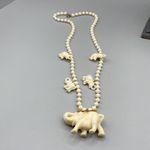 Vintage Celluloid large lucky Elephant statement necklace . Gold Photo 4